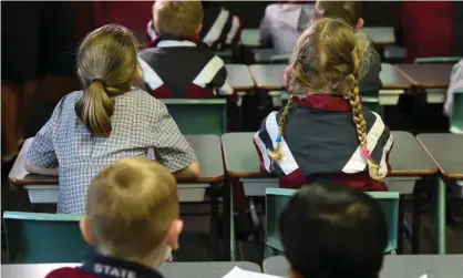  ??  ?? Teachers from across Australia have shared their stories of the demands placed on them and the impacts on mental health, work-life balance and quality of learning. Photograph: Dan Peled/AAP