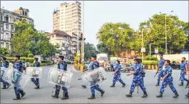  ??  ?? Police conduct a march from Azad Maidan Police Station to Marine Lines as part of poll preparatio­ns.