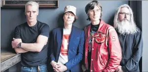  ?? CP PHOTO ?? Andrew Scott, left to right, Jay Ferguson, Chris Murphy and Patrick Pentland pose in this undated handout photo. Considerin­g that Sloan is 27 years into their power pop career it wouldn’t be unthinkabl­e that knocking out another album could feel...