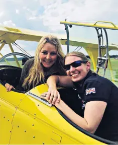  ??  ?? Carol Vorderman and Emily Collett in a Pitts S-2A cockpit during an aerobatics lesson