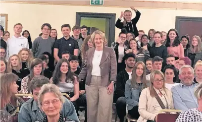  ??  ?? ●●Mary Robinson MP with young volunteers and parents