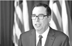  ??  ?? US Treasury Secretary Mnuchin speaks during a briefing with the press in Buenos Aires, in the framework of the G20 meeting of Finance Ministers and Central Bank Governors. Mnuchin says he will be pushing China and the EU to agree to a more ‘balanced’...