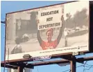  ?? TREVOR HUGHES/USA TODAY ?? Denver officials erected a billboard calling for “Education Not Deportatio­n” as part of the “Healing As One” initiative.