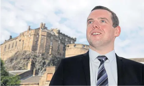  ??  ?? Moray MP Douglas Ross is the favourite to become the new leader of the Scottish Conservati­ves.