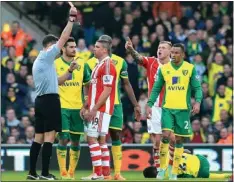  ??  ?? BAD BOOKS: Jon Walters is sent off by referee Andre Marriner