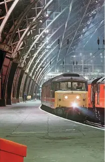  ?? ALAMY. ?? Does reorganisa­tion always bring improvemen­t? On January 25 1994, St Pancras hosts 47817 and 47707 Holyrood - two BR locomotive­s, but allocated to InterCity and Rail Express Systems respective­ly under BR’s sectorisat­ion that took place from the 1980s. Even bigger changes would begin in 1994 with the formation of Railtrack and BR’s progressiv­e privatisat­ion. Extensivel­y restored, St Pancras is now home to Eurostar.