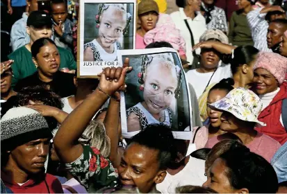  ?? Picture: Ruvan Boshoff ?? Protesters outside the Vredenburg magistrate’s court during the trial of Joshlin Smith’s mother and three others, who have been charged with kidnapping and human traffickin­g offences. More than 1,300 children are reported to go missing in South Africa every month.