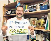  ??  ?? Matteo Salvini, leader of Italy’s League, thanks supporters with a poster: ‘First party in Italy. Thank you’