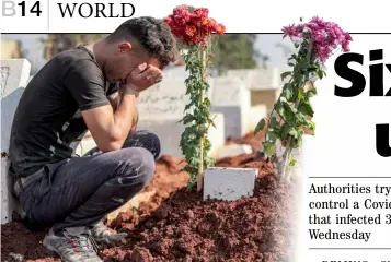  ?? OMAR HAJ KADOUR/AGENCE FRANCE-PRESSE ?? MOURNER grieves at the grave of one of the victims of an overnight bombardmen­t on the city of Azaz in Syria’s Aleppo province, at a cemetery in the town of Afis, close to the frontlines with Syrian government forces in the country’s northweste­rn Idlib province.