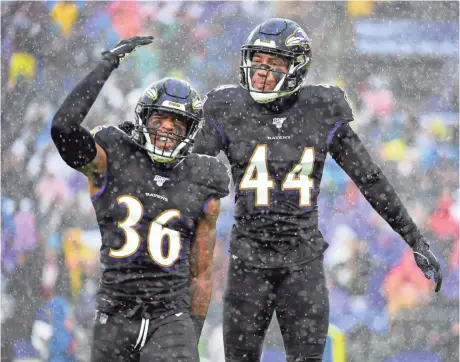  ?? EVAN HABEEB/USA TODAY SPORTS ?? Ravens safety Chuck Clark (36) celebrates with cornerback Marlon Humphrey after forcing a fumble in the first quarter Sunday against the 49ers at M&T Bank Stadium.