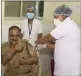  ??  ?? Thane police commission­er, Vivek Phansalkar taking the COVID vaccine, on Wednesday.