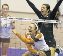  ??  ?? Texas’ Haley Eckerman (10), Hannah Allison (12) and Sarah Palmer celebrate a point against Southern California during the NCAA volleyball regional finals on Saturday.