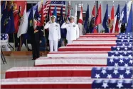  ?? AP PHOTO BY SUSAN WALSH ?? Vice President Mike Pence, left, Commander of U.S. Indo-pacific Command Adm. Phil Davidson, center, and Rear Adm. Jon Kreitz, deputy director of the POW/MIA Accounting Agency, attend at a ceremony marking the arrival of the remains believed to be of...