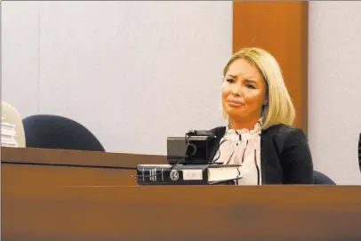  ??  ?? Christine Mackinday testifies Wednesday in the rape and attempted murder trial of her ex-boyfriend, former mixed martial arts fighter Jonathan Koppenhave­r, also known as War Machine, at the Regional Justice Center.