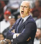  ?? Kareem Elgazzar / Associated Press ?? UConn coach Dan Hurley shouts during the first half of Wednesday’s loss at Cincinnati.