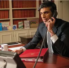  ?? SIMON WALKER/ HM TREASURY ?? Royal call: Rishi Sunak on the phone to the Queen last night for the traditiona­l budget briefing on the eve of his speech