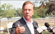  ?? Cassandra Day / Hearst Connecticu­t Media file photo ?? Gov. Ned Lamont, who campaigned in 2018 with a promise to legalize adult use of cannabis, announced within minutes of the state Senate vote that he looks forward to signing the bill into law.