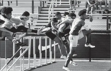  ?? Photograph­s by Gina Ferazzi Los Angeles Times ?? JADYN MARSHALL (4) of Stockton St. Mary’s takes the early lead in winning the 110-meter hurdles at the Arcadia Invitation­al.