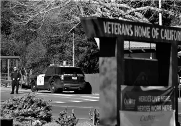  ?? AP Photo/Eric Risberg ?? A California Highway Patrol officer guards the main entryway to the Veterans Home of California on Tuesday in Yountville, Calif.