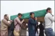  ?? AFP AFP ?? Afghans carry a coffin after an attack in Kabul this month.