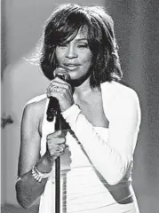  ?? MATT SAYLES/AP 2009 ?? A feature film about Whitney Houston and her journey from obscurity to pop stardom is in developmen­t.