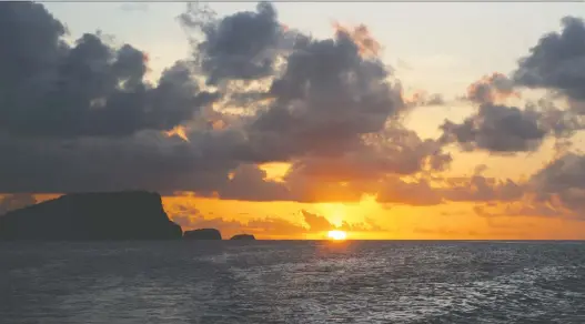  ?? PHOTOS: GETTY IMAGES ?? The sun sets on another relaxing day amid the idyllic serenity of Bequia Island. The quiet vacation destinatio­n maintains its old-caribbean feel.