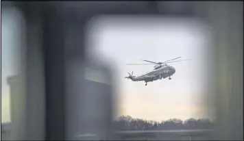  ?? STEPHEN CROWLEY / NEW YORK TIMES ?? President Donald Trump arrives at Dover Air Force Base in Delaware on Wednesday aboard Marine One to meet with the family of Chief Petty Officer William “Ryan” Owens, a Navy SEAL killed during a raid in Yemen.