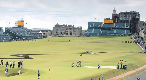  ??  ?? A view of the first and 18th fairways of the Old Course, showing Hamilton Grand, top right, partly hidden by the giant stand.