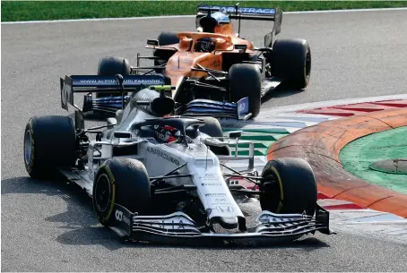  ?? AP ?? AlfaTauri driver Pierre Gasly of France leads Mclaren driver Carlos Sainz of Spain on his way to victory in the Italian Formula One Grand Prix on Sunday.
