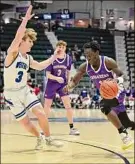  ?? ?? Adrian Kraus / Special to the Times Union Catholic Central's Darien Moore, right, scored a game-high 29 points in the Crusaders’ 66-61 loss to Westhill in the Class B state final in Glens Falls on Sunday.