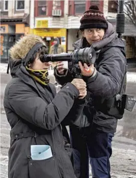  ?? Angal Field Focus Features ?? DIRECTOR Hittman, left, and Louvart collaborat­e on their bleak anti-road picture.