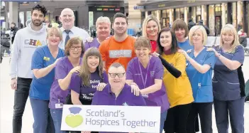  ??  ?? Strength in numbers Staff and volunteers celebrate the launch of Scotland’s Hospices Together