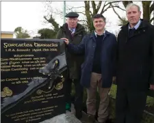  ??  ?? Dr Tim Horgan (centre) who unveiled the bright new monument at Gortatlea with organisers Billy Leen (left) and Jack Crowe.