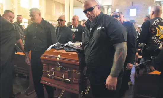  ?? Picture: Tracy Lee Stark ?? Friends and family of boxing legend Nick Durandt are pictured at his funeral held at the Our Lady of Lebanon Catholic Church in Johannesbu­rg South yesterday.