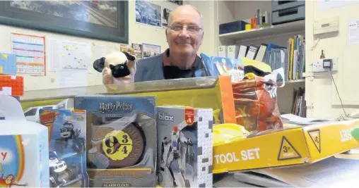  ??  ?? Pictured is Michael Stokes from the Great Central Railway with some of the toys that have been donated following the theft last week.