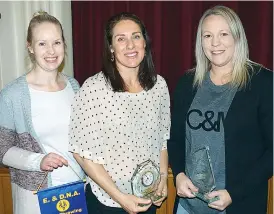  ??  ?? Warragul Industrial­s’ Megan Spencer (centre) wins best and fairest with Buln Buln’s Danielle Bridger (right) runner-up and Ellinbank’s Stefanie Backman accepting the goal throwing award.