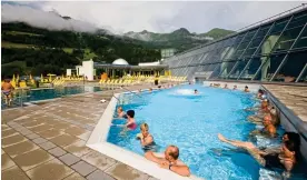  ??  ?? Great outdoors: Relaxing in thermal spas is a perfect après-ski treat