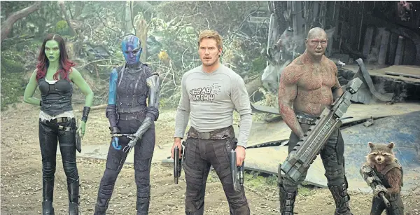  ??  ?? From left, Zoe Saldana, Karen Gillan, Chris Pratt, Dave Bautista and Rocket, voiced by Bradley Cooper, in a scene from Guardians Of The Galaxy Vol. 2.