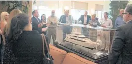  ?? COURTESY PHOTOS ?? Go Broward spokesman Dana Pollitt addresses guests during the Broward Penny for Transporta­tion campaign kickoff fundraiser at the luxury aircraft terminal of Banyan Air Services located at the Fort Lauderdale Executive Airport.