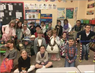  ?? SUBMITTED BY KIM CANNING ?? Second-grade students at St. Teresa of Calcutta School in Limerick dressed as 100-year-olds for the 100th day of school, accessoriz­ing with walkers, canes and glasses.