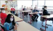  ??  ?? Des conditions particuliè­res en classe