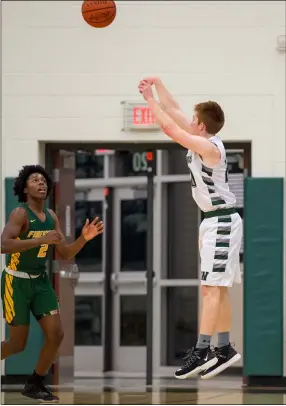  ?? AIMEE BIELOZER — FOR THE MORNING JOURNAL ?? Westlake guard Cal Reghi shoots a 3-pointer against Firestone on Feb. 24.