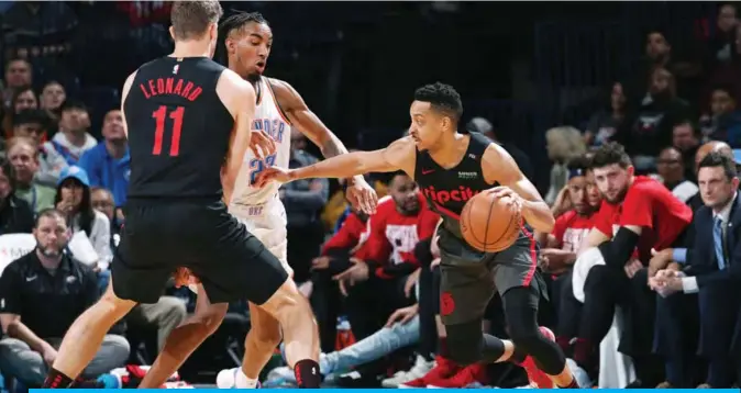  ??  ?? OKLAHOMA CITY: CJ McCollum #3 of the Portland Trail Blazers handles the ball against the Oklahoma City Thunder on Monday at Chesapeake Energy Arena in Oklahoma City, Oklahoma. — AFP