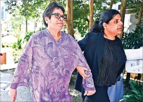  ?? MOHD RASFAN/AFP ?? Maria Elvira Pinto Exposto (left) leaves a Kuala Lumpur courthouse after winning her final appeal against a death sentence for traffickin­g drugs.