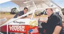  ?? Picture: Kevin Farmer ?? TOP JOB: Danny Smith (right) gives David Budden's restoratio­n job the tick of approval. Budden restored the Kenny Rogers The Gambler chasis which was driven by Smith.