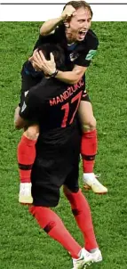  ?? —AFP ?? Veterans Mandzukic and Modric celebrate.