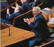  ?? ANDREW HARNIK/AP ?? House GOP leader Kevin McCarthy applauds during the 12th round of voting for the speakershi­p Friday.