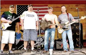  ?? RITA GREENE/MCDONALD COUNTY PRESS ?? The Lickitty Split band provided great entertainm­ent at Jesse James Days Friday, Aug. 12. Left to right: Eddie Bartley, Jason Faulconer, Beau Jeffries, and Shane Hilburn.