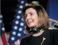  ?? ANDREW HARNIK — THE ASSOCIATED PRESS ?? House Speaker Nancy Pelosi of California smiles during a news conference on Capitol Hill on Thursday in Washington.