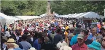  ??  ?? Huge crowds come together each year for the Santa Fe Indian Market.